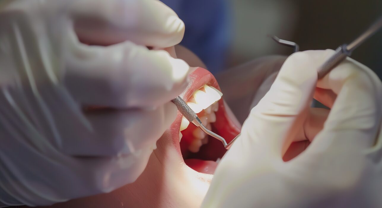 Dentist discussing urgent tooth treatment and emergency dental care